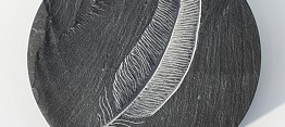 Carved feather