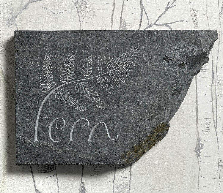 Riven slate fern with carving