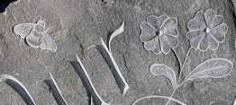 Primrose and bumble bee carving