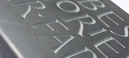 Incised lettering